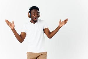 man african appearance with open mouth headphones listening to music emotion photo