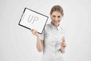 Businesswoman in a white shirt with a folder in hand isolated background photo