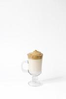 Dalgon's trending drink is coffee. Coffee mug in clear glass on a white background photo