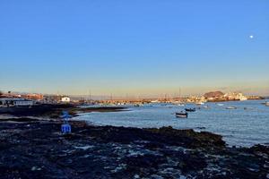 landscape with the city and the ocean on a warm day, on the Spanish Canary Island Fuerteventura photo