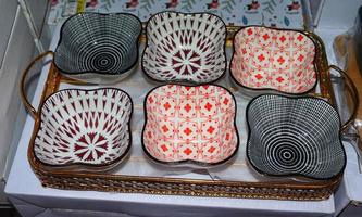 Top view of 6 decorative bowls in tray,multicolor serving bowls photo