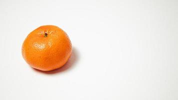 Tangerine on a white background with space for your text. photo