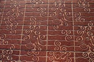 terracotta brick background with an interesting pattern photo