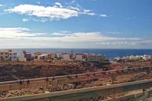 landscapes from the Spanish island of Tenerife with the highway and the ocean photo