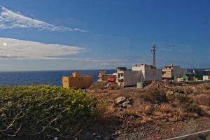 landscapes from the Spanish island of Tenerife with the highway and the ocean photo