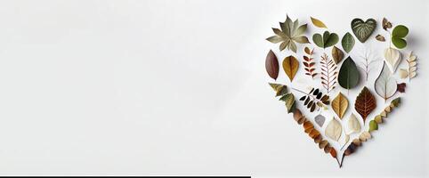 leafs and rustic leaf gathered make a shape of heart photo