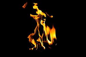 Fire flame texture. Burning material backdrop. Burn effect pattern. Blaze and torch wallpaper. Heat and haze backdrop. photo