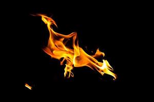 Fire flame texture. Burning material backdrop. Burn effect pattern. Blaze and torch wallpaper. Heat and haze backdrop. photo