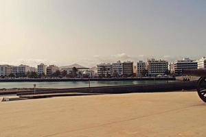 seaside landscape from the capital of the Canary Island Lanzarote Arrecife in Spain on a sunny warm summer day photo