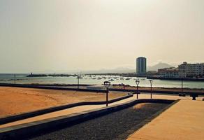 seaside landscape from the capital of the Canary Island Lanzarote Arrecife in Spain on a sunny warm summer day photo