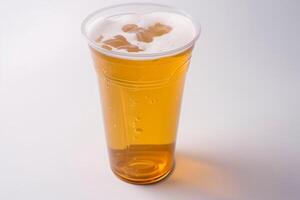 vaso de cerveza en un el plastico vaso en un blanco antecedentes creado con generativo ai tecnología. foto