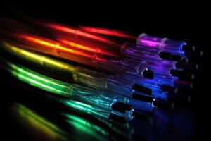 algunos fibra óptico cables brillante a el final en diferente colores en contra un negro antecedentes creado con generativo ai tecnología. foto