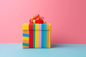 A beautiful birthday present box on a colorful background created with technology. photo