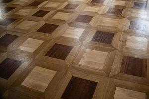 original background from an antique old wooden floor creating an interesting abstract pattern photo