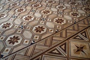 original background from an antique old wooden floor creating an interesting abstract pattern photo