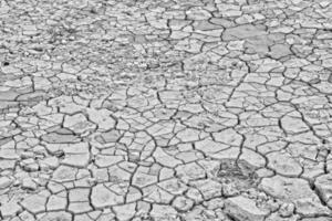 natural abstract background texture of dried cracked bright limestone soil in turkey photo