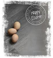 postcard for Easter with eggs lying on a neutral background photo