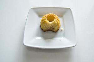 sweet simple easter cake on a white telerzyk on a white background photo