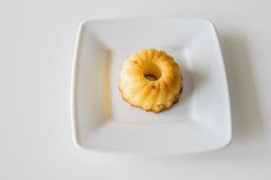 sweet simple easter cake on a white telerzyk on a white background photo