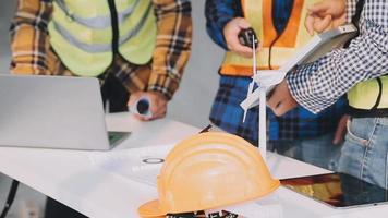 Two Specialists Inspect Commercial, Industrial Building Construction Site. Real Estate Project with Civil Engineer, Investor Use Laptop. In the Background Crane, Skyscraper Concrete Formwork Frames video