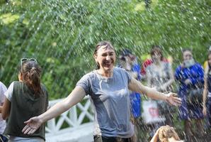 Russia, Moscow, 27.07.2019. Park of culture and rest. Women bathe in the fountain photo