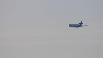 The aircraft on the final approach before landing on the background of the sunset dusk sky video