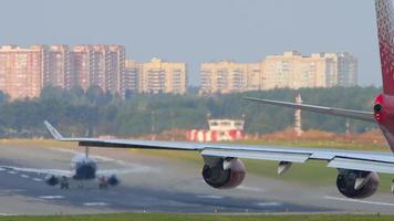 MOSCOW, RUSSIAN FEDERATION SEPTEMBER 12, 2020 - Rossiya Boeing 747 lining up on the runway before departure behind aircraft running for take off video