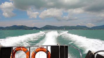 Boat Sailing on Ocean. Waves from the back of a speed boat over the water's surface in sea. View from the back of a ship video