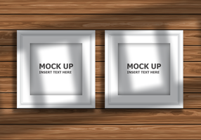 Editable mock up display with blank picture frames on wooden texture psd