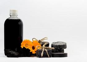 group of handmade cosmetics with activated carbon photo