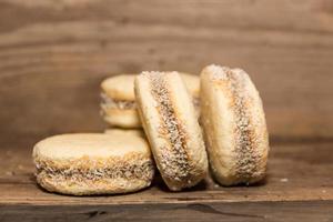 alfajores of cornstarch and dulce de leche, traditional of Argentine gastronomy photo