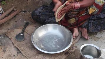 Indian Village food is made by Women by hand in the traditional way this is millet bread popular in Gujarat India video