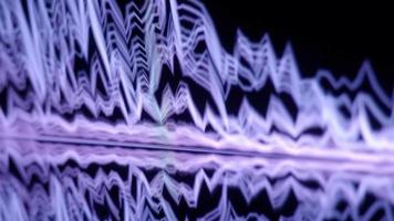 Sound Equalizer. Digital music or sound wave footage. audio waveform equalizer scale on black loop animation. color music equalizer abstract. gradient spectrum bar graph. Wave Glowing Pulsing dancing video