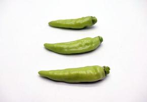 Light green chili pepper or Cayenne pepper isolated on white background photo