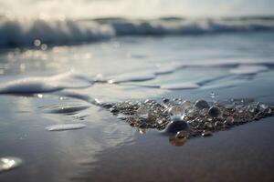 Splashing Wave on Sandy Shore with Sparkling Sunshine on Water. . photo