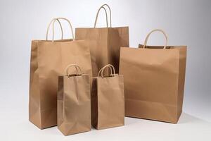 Paper bag mockups of shopping, gifts and food packages realistic vector design. White, brown and black bags or boxes, made of craft paper or cardboard with cord handle. . photo