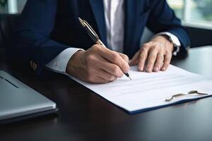 Close-up Of Businessperson Signing Contract, writing paper at the desk with pen and reading books at table with basic business Form document working in office. . photo