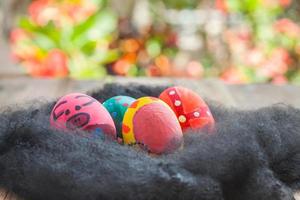 easter egg on wood photo