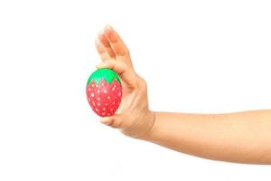 hand holding a easter egg on white photo