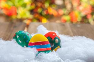 easter egg on wood photo