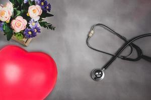 Red heart sign and stethoscope on background, Valentine concept. photo