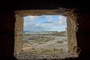 View through the stone window photo