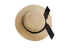 Beautiful summer hat with black ribbon, isolated on white photo