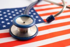 Stethoscope on USA America flag background, Business and finance concept. photo