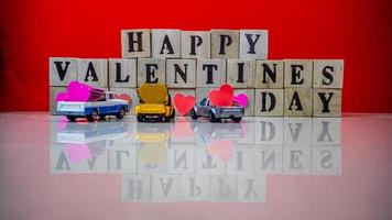 minahasa, Indonesia January 2023, Happy valentine day on wooden blocks photo