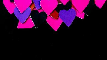 multicolored heart on black background for valentine's day photo