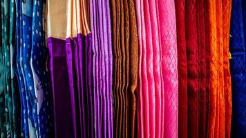 a variety of colorful curtains in the curtain shop photo