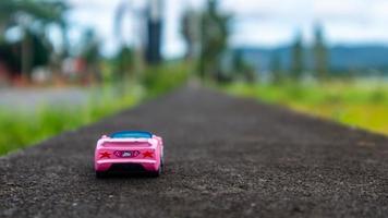 minahasa, Indonesia January 2023, toy car in the rice field photo