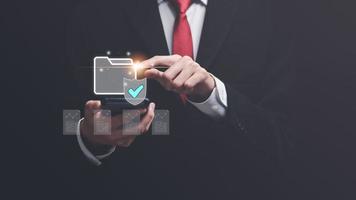 quality assessment management With a checklist, accounting documents ,auditor ,ERP document system management ,business document evaluation process, office worker working with document folder photo
