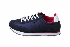 Sport shoes. Blue sneaker with white laces. photo